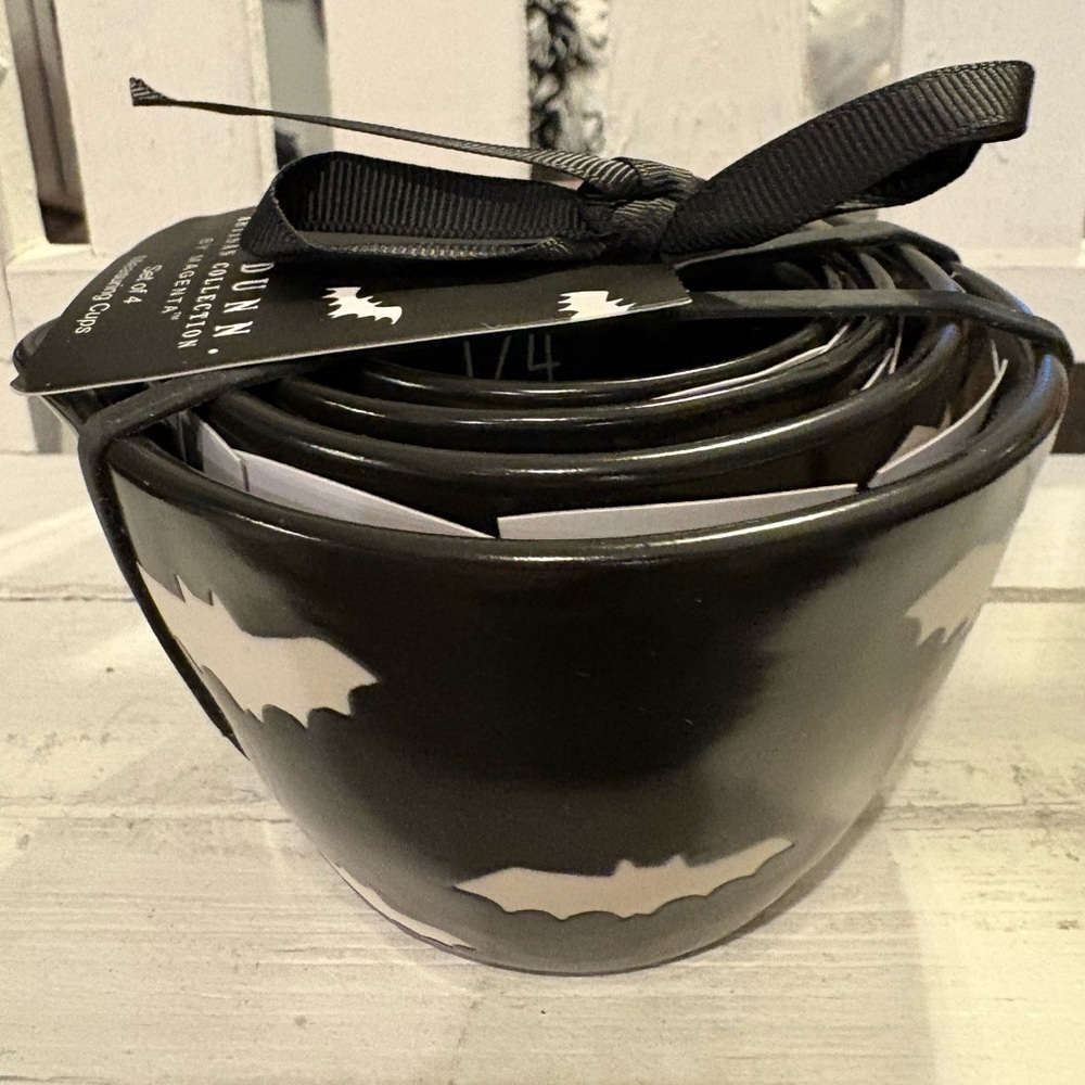 Rae Dunn Black Measuring Cups with White Bat Design